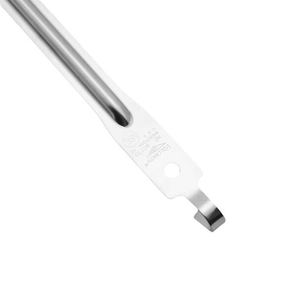 A silver Vollrath hooked handle solid spoon.