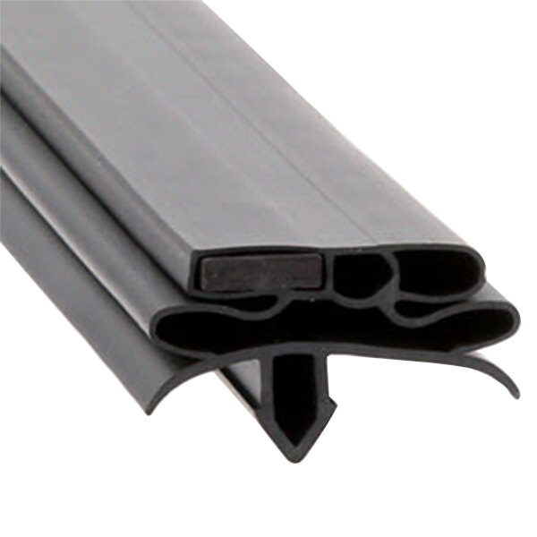 A close-up of a black rubber door gasket with two holes.