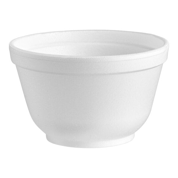 A close up of a Dart white styrofoam bowl.