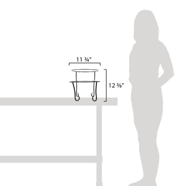 A woman using an American Metalcraft Ironworks two-tier round display stand on a table.