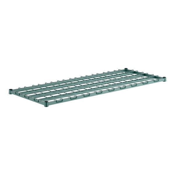 A Regency green epoxy wire dunnage shelf with metal clips and a wire mat.