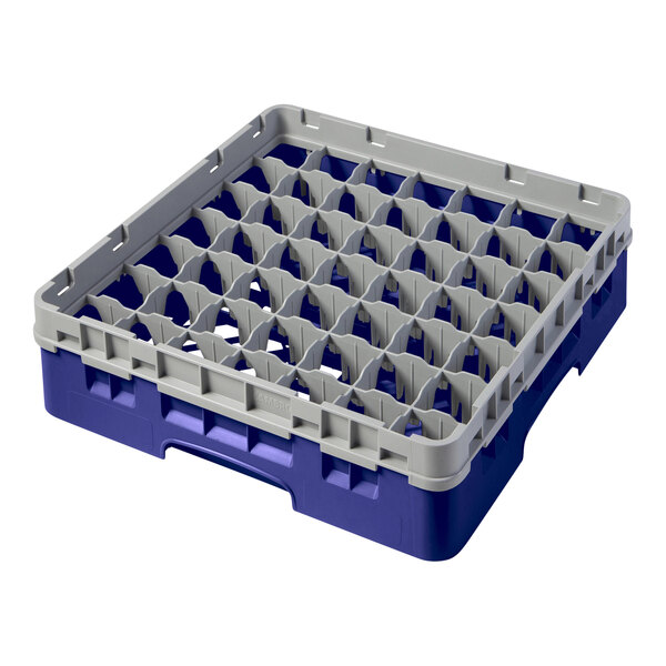 A navy blue and grey plastic Cambro glass rack with 49 compartments and 1 extender.