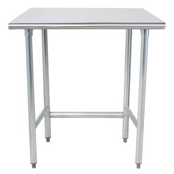 An Advance Tabco stainless steel work table with metal legs.