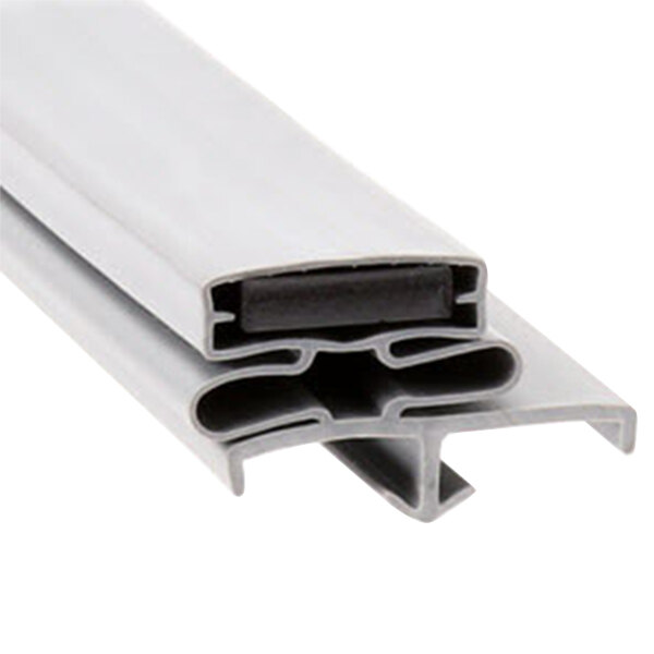 A black and white plastic gasket with two holes.