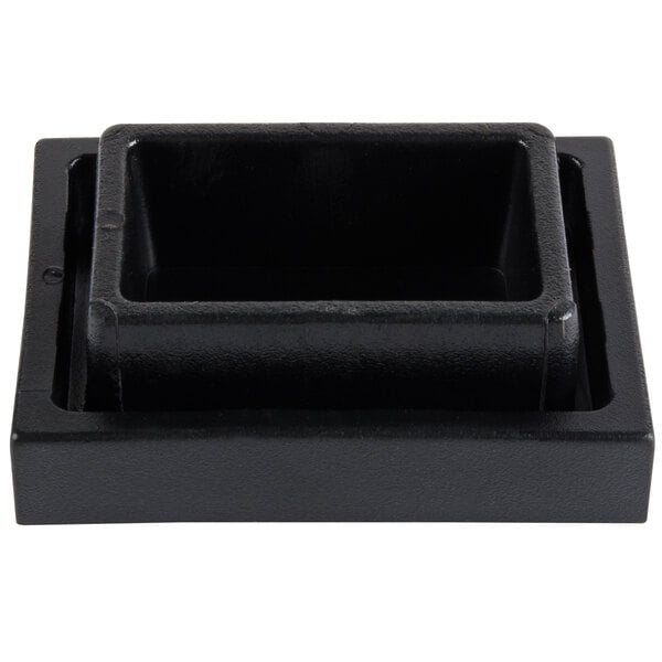 A black rectangular rubber foot for an Avantco mixer.