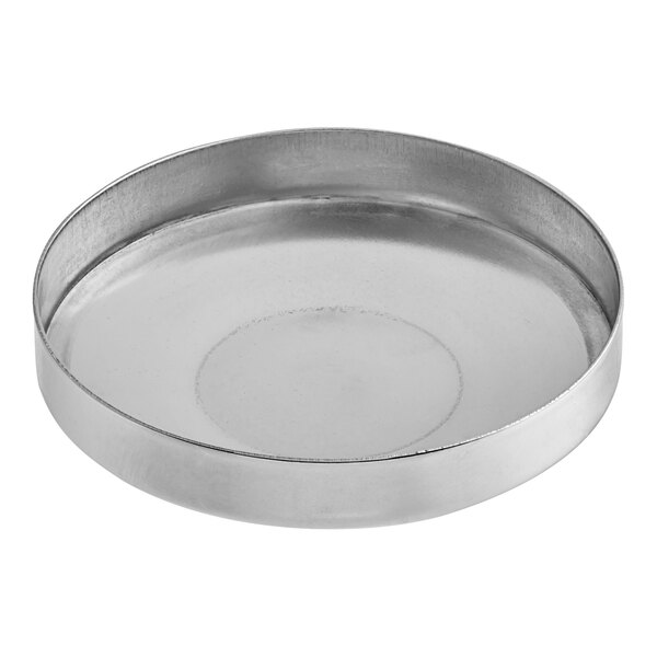 A round metal cap with a circular rim on a white background.