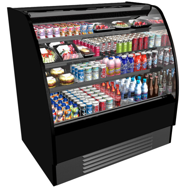 A Structural Concepts Harmony air curtain merchandiser with drinks and snacks inside.