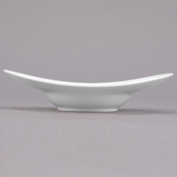 A white porcelain bowl with a curved edge.