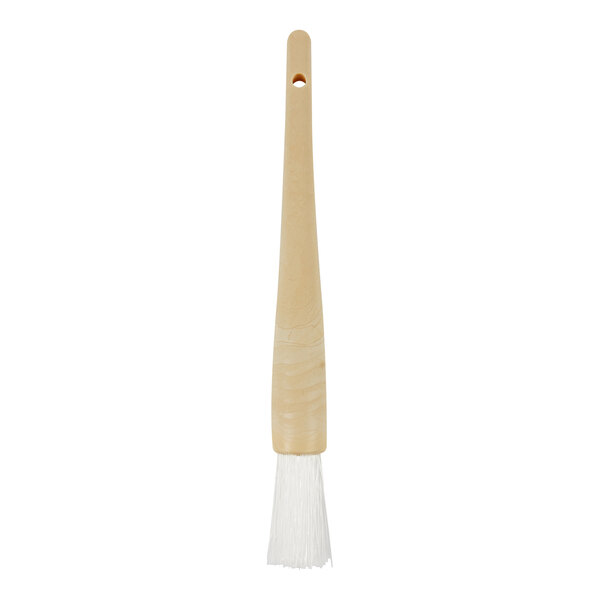 A brush with a light-colored wooden handle and white bristles, shown against a plain background.
