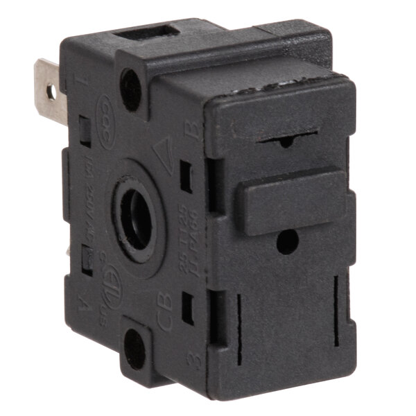 A black square electrical switch with a metal pin.