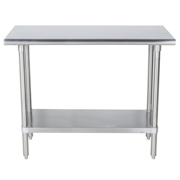 An Advance Tabco stainless steel work table with a shelf.