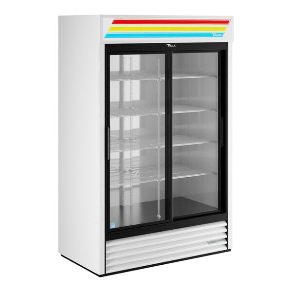 A white refrigerated sliding glass door merchandiser with LED lighting and multiple shelves.