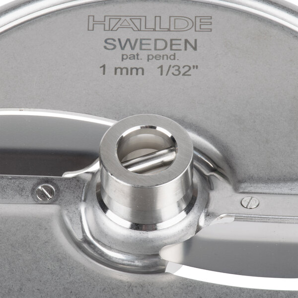 A stainless steel Hobart 1/32" slicing plate with a circular hole.