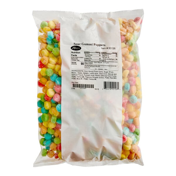 A bag of Albanese Sour Gummi Poppers on a white background.