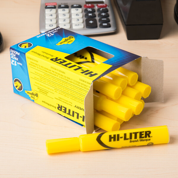 A box of Avery Hi-Liter Light Yellow Highlighters on a shelf next to pens.