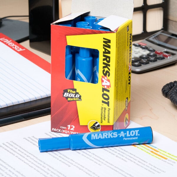 A box of Avery Marks-A-Lot blue markers on a table.