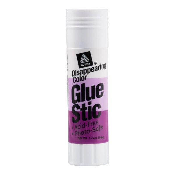 A white cylindrical glue stick with a purple and white label indicating it is a disappearing color, acid-free, and photo-safe.