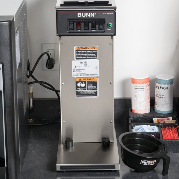 A Bunn airpot coffee brewer on a counter.
