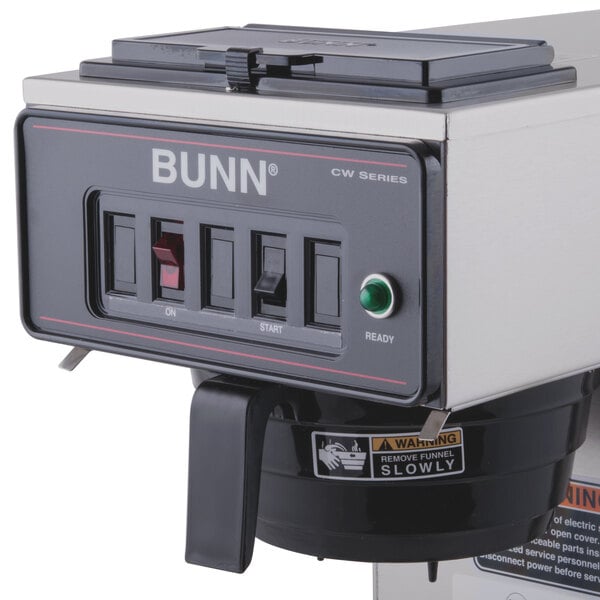 A close-up of a Bunn airpot coffee maker on a counter.