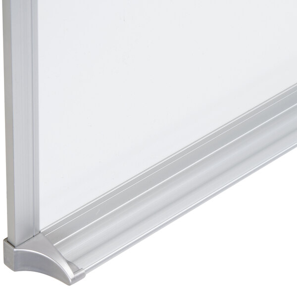 A white melamine dry erase board with a satin aluminum frame.