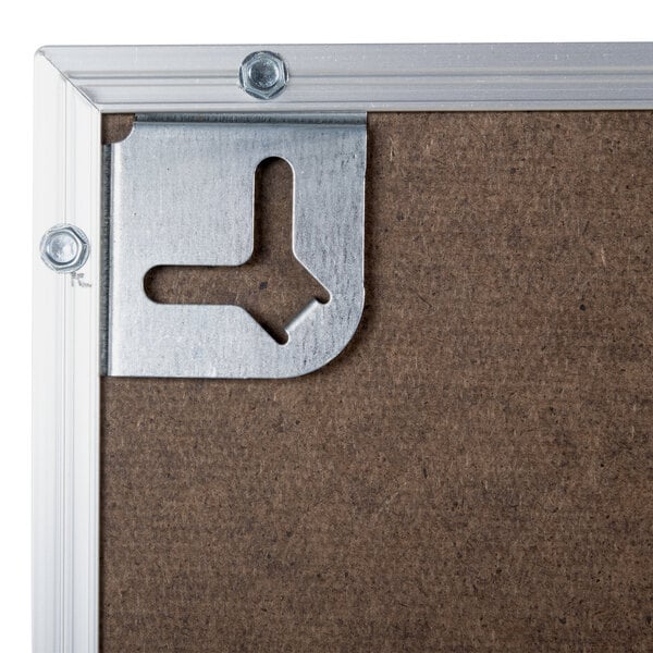 A white melamine dry erase board with a satin aluminum frame.