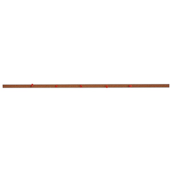 A Universal brown cork bulletin bar with red dots on it.