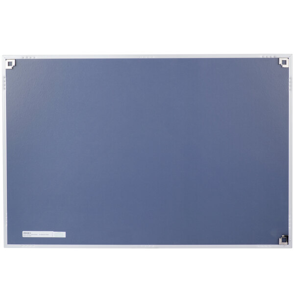A cork board with a white background and aluminum frame.