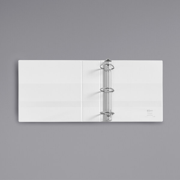 A white Avery Durable View binder with metal rings.