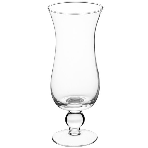 An Acopa hurricane glass with a small base.