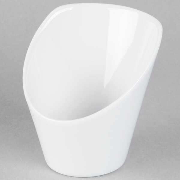 A close-up of a TuxTrendz bright white china bowl with a high back and a small hole in the middle.