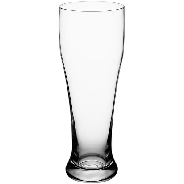 An Acopa clear Pilsner glass on a white background.
