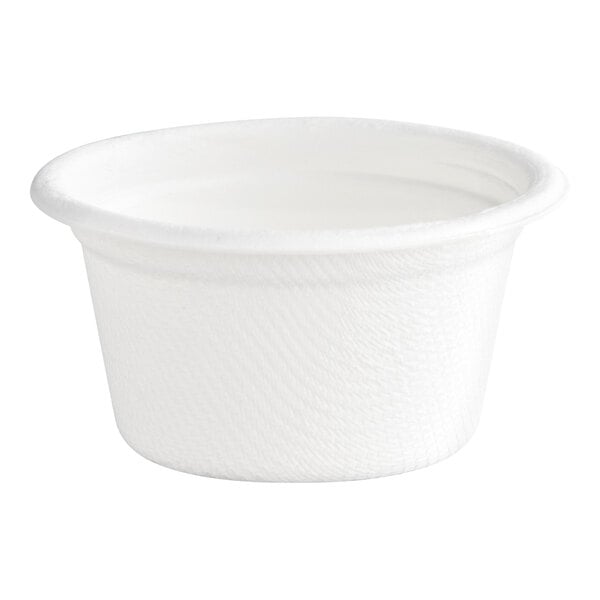 A small white compostable plant fiber portion cup.