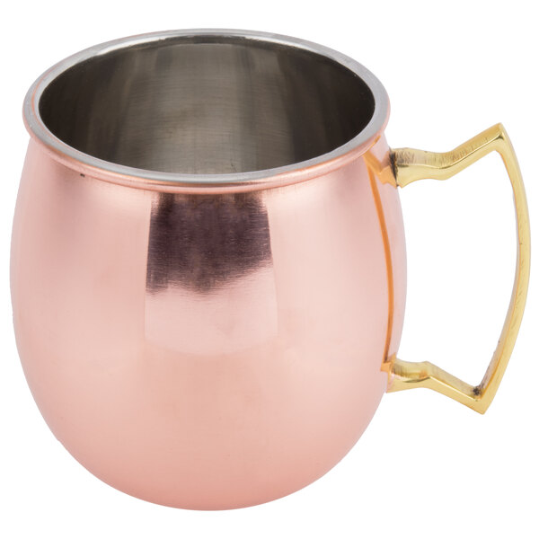 An American Metalcraft copper Moscow Mule mug with a gold handle.