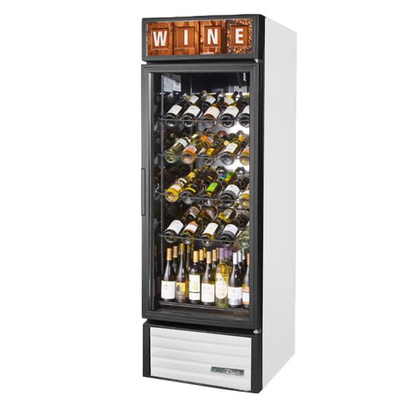 A True white refrigerated glass door wine merchandiser full of wine bottles.