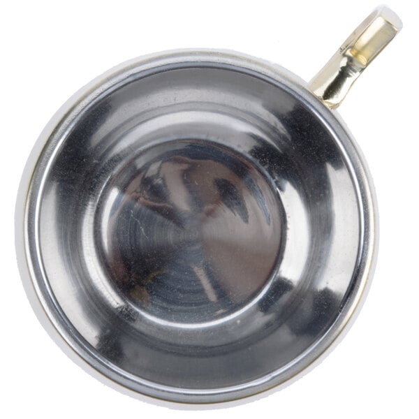 A close-up of an American Metalcraft Mirrored Gold Moscow Mule Mug.