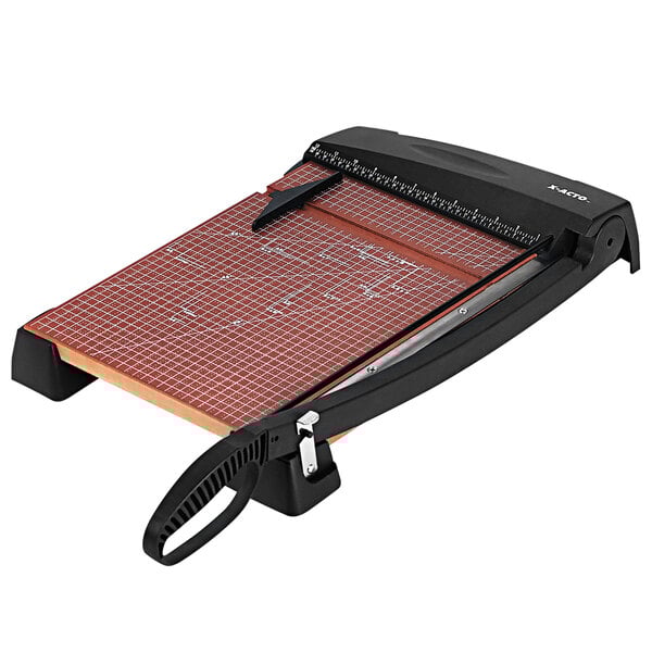 An X-Acto paper cutter with a wood base and a black handle.