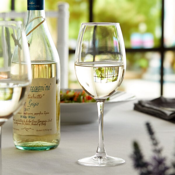 Riesling glass filled with riesling wine on an elegant table