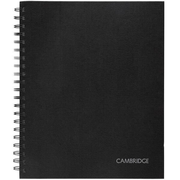 A black Cambridge Limited hardbound notebook with a spiral binding.