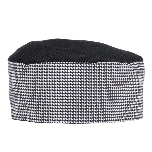 A black and white houndstooth mesh top chef's skull cap.