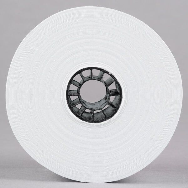 A white Universal Office paper roll with a hole in the center.