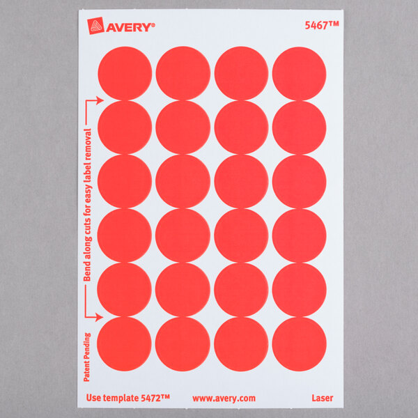 A package of white paper with red circles of Avery round removable labels.