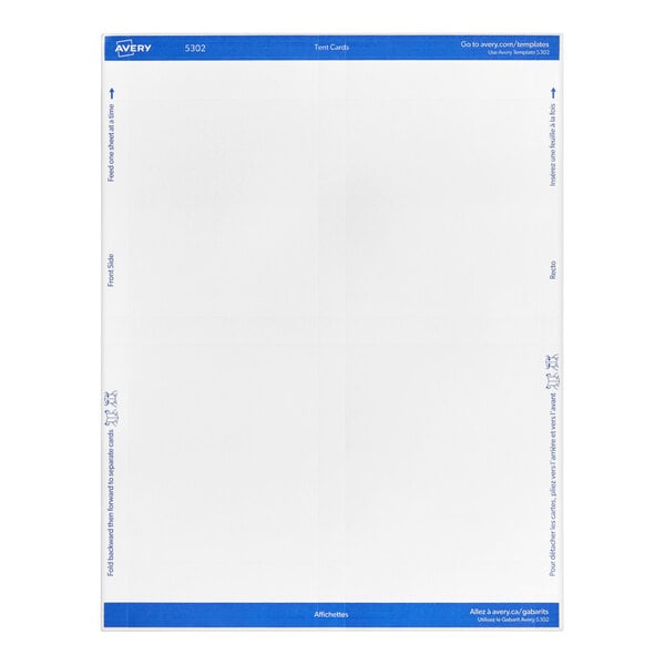 A white rectangular object with blue writing on it.