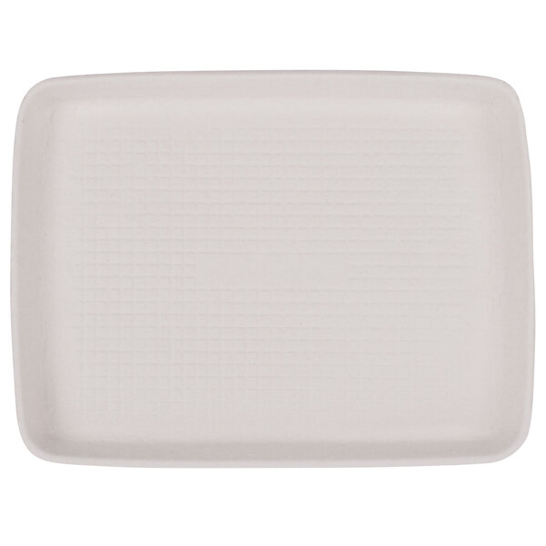 A white rectangular Huhtamaki Chinet molded fiber tray with a grid pattern.