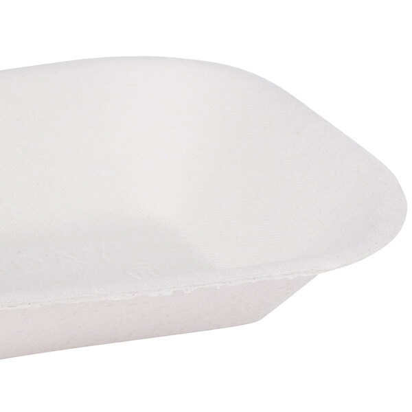 A white rectangular Huhtamaki Chinet paper food tray with curved edges.