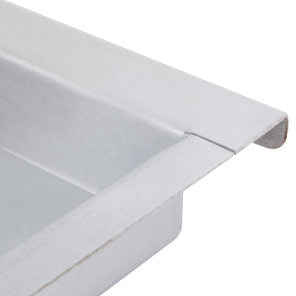 A close up of a metal tray.