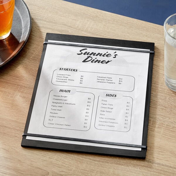 A black wood Choice menu holder with a menu on a table.