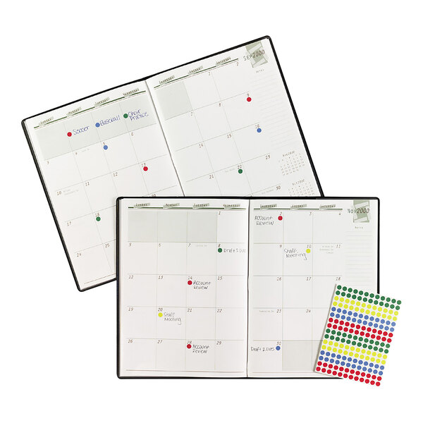 A calendar with colorful Avery round stickers with a pen.