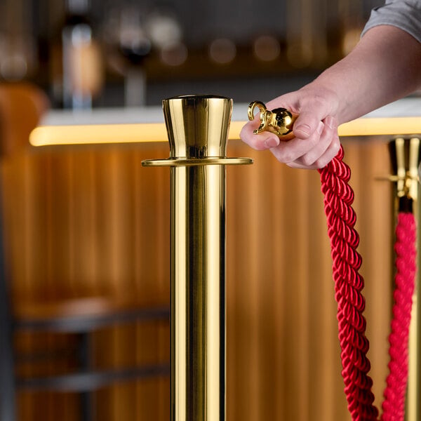 Lancaster Table & Seating Red 5' Braided Rope with Gold Ends for Rope Style Crowd Control / Guidance Stanchion