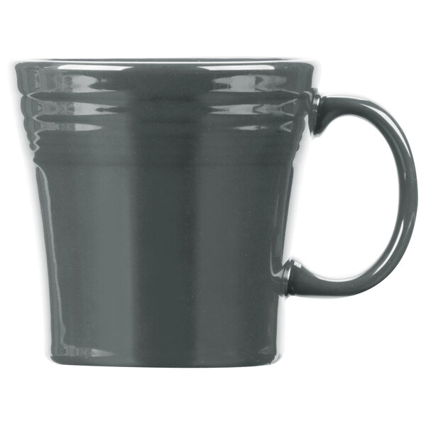 A grey mug with a handle.