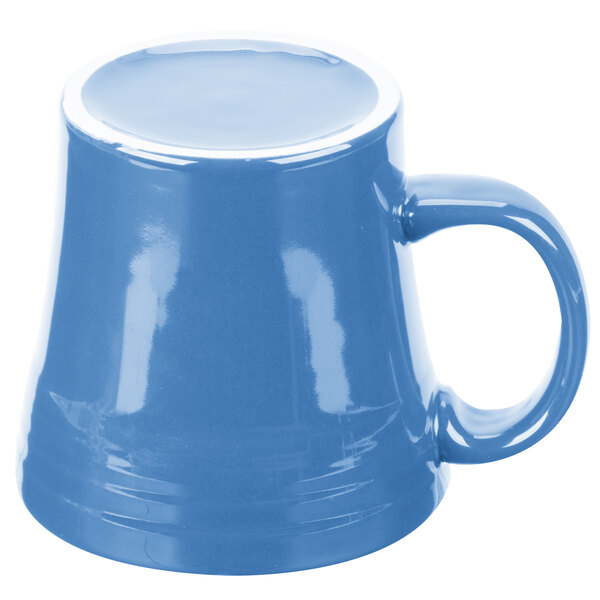 A blue Fiesta china mug with a white rim and handle.